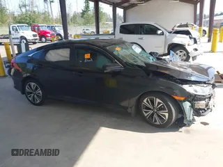 2016 Honda Civic EX-L z VIN 2HGFC1F76GH650308, wystawiony jako IAAI lot #42408661 z przebiegiem Nie podano mil oraz . Historia ofert i sprzedaży dostępna na DreamBid. Obrazek 13.