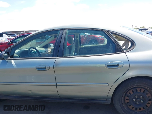 2005 Ford Taurus SE with VIN 1FAFP53U75A226240, listed as a IAAI auction lot 42066974 with 190,043 mi miles. Bid and sale history available at carsss.com. Image 14.