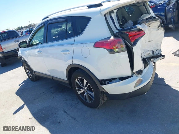 2016 Toyota RAV4 XLE with VIN JTMWFREV3GJ082487, listed as a IAAI auction lot 41833158 with 107,332 mi miles. Bid and sale history available at carsss.com. Image 14.