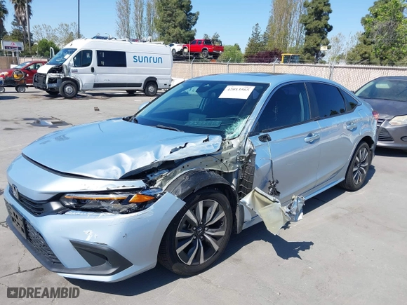 2022 Honda Civic Sedan EX with VIN 2HGFE1F77NH309152, listed as a IAAI auction lot 42013565 with 25,474 mi miles. Bid and sale history available at carsss.com. Image 12.