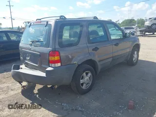 2002 Ford Escape XLS Value with VIN 1FMYU01B32KD20469, listed as a IAAI auction lot 42553573 with 353,752 mi miles and . Bid and sale history available at DreamBid. Image 4.