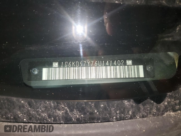2006 Cadillac DTS 1SC z VIN 1G6KD57Y76U141402, wystawiony jako Copart lot #58715675 z przebiegiem 148 042 mil mil oraz Szkoda całkowita • Salvage title. Historia ofert i sprzedaży dostępna na DreamBid. Obrazek 12.