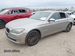 2012 BMW 7 Series 740i with VIN WBAKA4C51CC613670, listed as a IAAI auction lot 41582639 with 149,753 mi miles. Bid and sale history available at carsss.com. Image 2.
