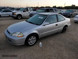 1998 Honda Civic EX with VIN 1HGEJ8148WL016927, listed as a Copart auction lot 74152574 with 130,667 mi miles and Salvage Title. Bid and sale history available at carsss.com. Image 1.