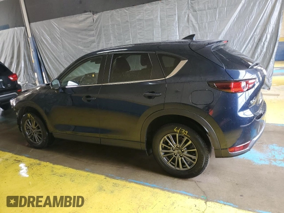 2021 Mazda CX-5 Touring with VIN JM3KFACMXM0334139, listed as a Copart auction lot 55362905 with 117,279 mi miles and Clean Title. Bid and sale history available at DreamBid. Image 2.