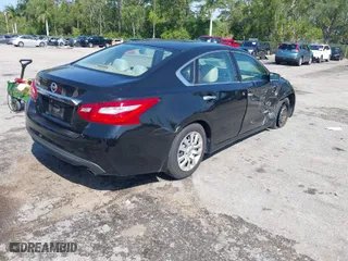 2016 Nissan Altima 2.5 S with VIN 1N4AL3AP7GC174588, listed as a IAAI auction lot 41883382 with 76,469 mi miles. Bid and sale history available at carsss.com. Image 4.