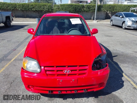 2003 Hyundai Accent GL with VIN KMHCG45C93U487209, listed as a IAAI auction lot 41590636 with 118,811 mi miles. Bid and sale history available at carsss.com. Image 12.