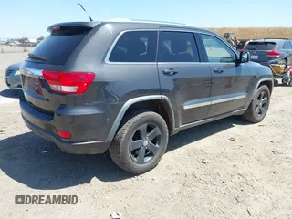 2011 Jeep Grand Cherokee Laredo with VIN 1J4RR4GG7BC715778, listed as a IAAI auction lot 42313636 with 249,209 mi miles and . Bid and sale history available at DreamBid. Image 4.