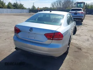 2015 Volkswagen Passat 1.8T Limited Edition with VIN 1VWAT7A32FC043594, listed as a IAAI auction lot 41867799 with 195,144 mi miles. Bid and sale history available at carsss.com. Image 4.