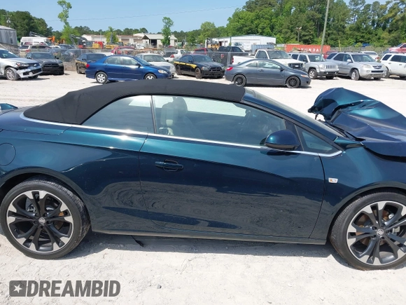 2018 Buick Cascada Sport Touring z VIN W04WJ3N5XJG085431, wystawiony jako IAAI lot #42129756 z przebiegiem 24 364 mil mil oraz . Historia ofert i sprzedaży dostępna na DreamBid. Obrazek 13.
