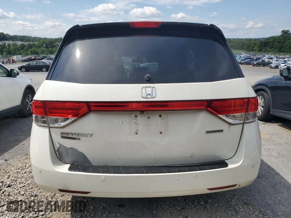 2014 Honda Odyssey Touring with VIN 5FNRL5H94EB080815, listed as a Copart auction lot 65244325 with 153,314 mi miles and Salvage title. Bid and sale history available at DreamBid. Image 6.