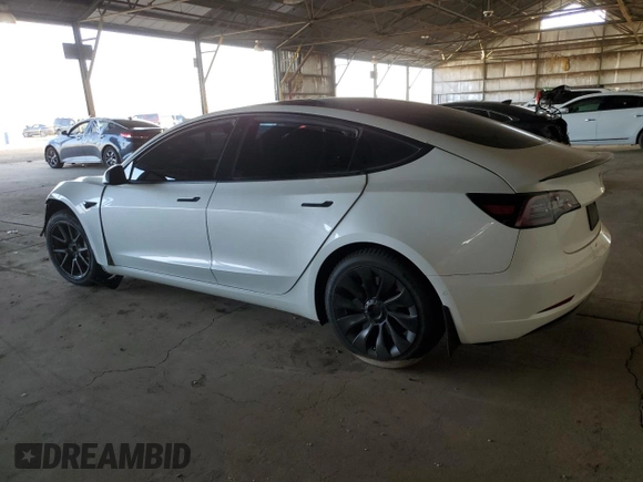2021 Tesla Model 3 Long Range with VIN 5YJ3E1EB4MF938427, listed as a Copart auction lot 88270665 with 67,246 mi miles and Salvage Title. Bid and sale history available at carsss.com. Image 2.