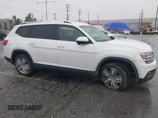 2019 Volkswagen Atlas SE z VIN 1V2WR2CA8KC504134, wystawiony jako IAAI lot #41700050 z przebiegiem 97 047 mil mil oraz . Historia ofert i sprzedaży dostępna na DreamBid. Obrazek 13.
