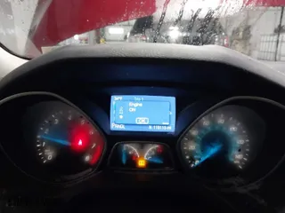 2014 Ford Focus SE with VIN 1FADP3K27EL165701, listed as a IAAI auction lot 41592736 with 119,115 mi miles. Bid and sale history available at carsss.com. Image 7.