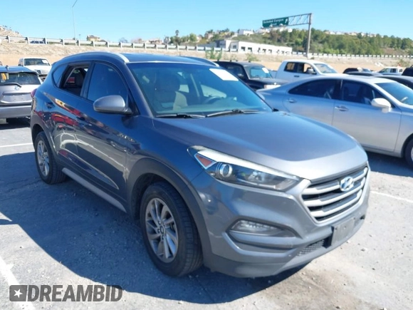 2018 Hyundai Tucson SEL with VIN KM8J3CA42JU618764, listed as a IAAI auction lot 41677046 with 127,980 mi miles. Bid and sale history available at carsss.com. Image 1.