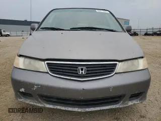 2000 Honda Odyssey EX z VIN 2HKRL186XYH010384, wystawiony jako Copart lot #60871845 z przebiegiem 423 167 mil mil oraz Czysty tytuł • Clean title. Historia ofert i sprzedaży dostępna na DreamBid. Obrazek 5.