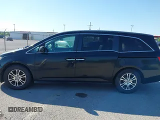 2011 Honda Odyssey EX-L with VIN 5FNRL5H66BB058333, listed as a IAAI auction lot 42172045 with 215,723 mi miles and . Bid and sale history available at carsss.com. Image 14.