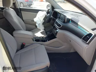 2019 Hyundai Tucson Value with VIN KM8J33A43KU065995, listed as a IAAI auction lot 41720471 with 95,732 mi miles. Bid and sale history available at carsss.com. Image 5.