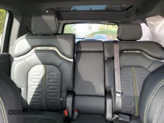 2024 Rivian R1S Adventure z VIN 7PDSGABAXRN035766, wystawiony jako Copart lot #77481034 z przebiegiem 6 590 mil mil oraz Szkoda całkowita • Salvage title. Historia ofert i sprzedaży dostępna na DreamBid. Obrazek 10.