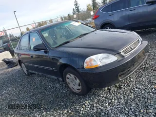 1997 Honda Civic EX with VIN 2HGEJ8542VH520783, listed as a IAAI auction lot 40744085 with 155,772 mi miles. Bid and sale history available at carsss.com. Image 1.