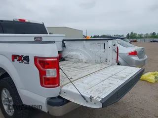 2018 Ford F-150 XL with VIN 1FTFW1E58JKE22834, listed as a IAAI auction lot 41923960 with 214,459 mi miles. Bid and sale history available at carsss.com. Image 18.