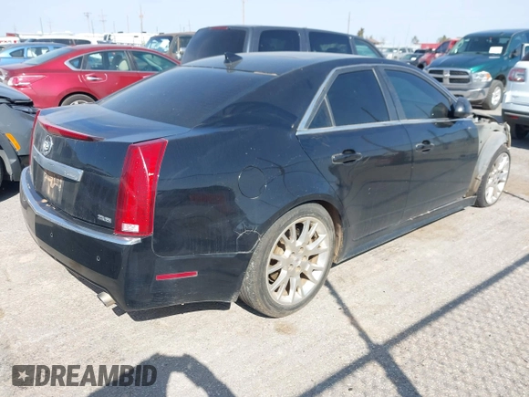 2011 Cadillac CTS Premium with VIN 1G6DS5ED9B0151820, listed as a IAAI auction lot 41909346 with 142,007 mi miles. Bid and sale history available at carsss.com. Image 4.