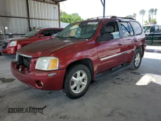 2006 GMC Envoy SLT with VIN 1GKDT13S862248719, listed as a Copart auction lot 56990474 with Not Provided miles and Clean Title. Bid and sale history available at carsss.com. Image 1.