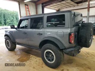 2021 Ford Bronco с VIN 1FMEE5DP9MLB06877, выставлен на аукционе Copart как лот 57254245 с пробегом 47 410 миль миль и Списание • Salvage title. История ставок и продаж доступна на DreamBid. Изображение 2.