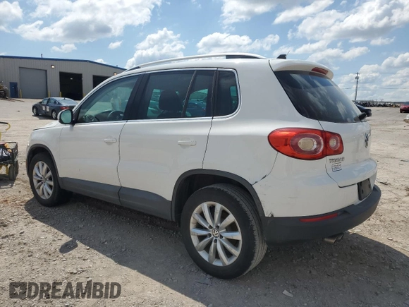 2011 Volkswagen Tiguan SEL w/Premium Navi z VIN WVGAV7AX1BW540155, wystawiony jako Copart lot #56483975 z przebiegiem 137 970 mil mil oraz Czysty tytuł • Clean title. Historia ofert i sprzedaży dostępna na DreamBid. Obrazek 2.