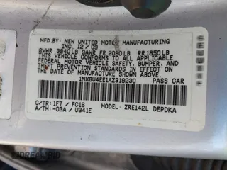 2010 Toyota Corolla with VIN 1NXBU4EE1AZ319230, listed as a IAAI auction lot 41988978 with 238,497 mi miles. Bid and sale history available at carsss.com. Image 9.