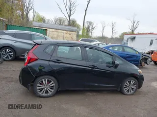 2015 Honda Fit EX-L with VIN 3HGGK5H88FM726406, listed as a IAAI auction lot 42033501 with 124,216 mi miles. Bid and sale history available at carsss.com. Image 13.
