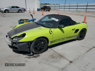 1999 Porsche Boxster with VIN WP0CA2987XU622760, listed as a Copart auction lot 59898355 with 104,425 mi miles and Salvage title. Bid and sale history available at DreamBid. Image 1.