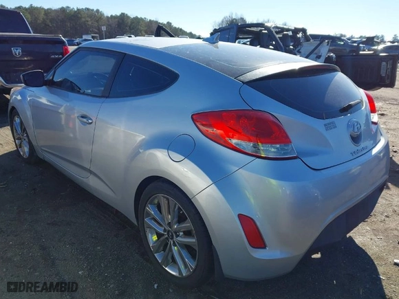 2016 Hyundai Veloster with VIN KMHTC6AD3GU297790, listed as a IAAI auction lot 41077297 with 117,239 mi miles. Bid and sale history available at carsss.com. Image 3.