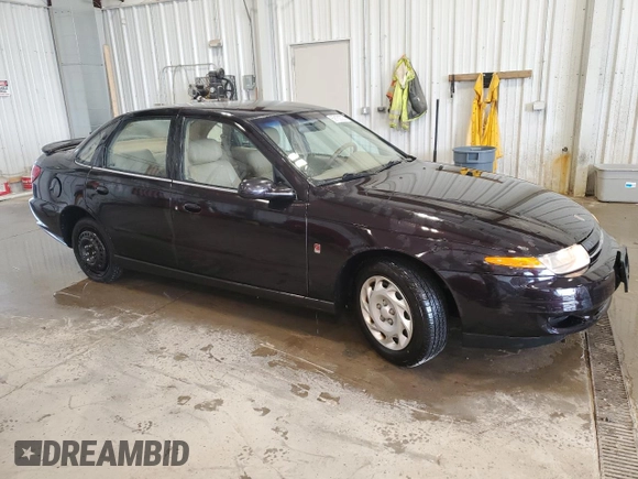 2000 Saturn LS z VIN 1G8JU52FXYY601270, wystawiony jako Copart lot #59182225 z przebiegiem 262 220 mil mil oraz Nie do naprawy • Non repairable. Historia ofert i sprzedaży dostępna na DreamBid. Obrazek 4.