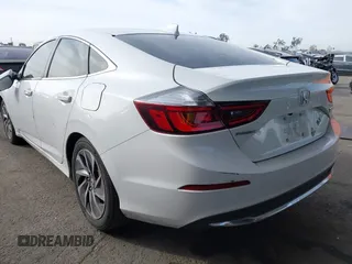 2021 Honda Insight Touring with VIN 19XZE4F97ME002699, listed as a IAAI auction lot 41397130 with 213,920 mi miles and . Bid and sale history available at carsss.com. Image 3.