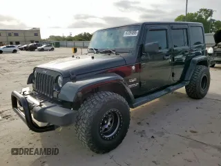 2012 Jeep Wrangler Unlimited Altitude with VIN 1C4HJWEGXCL180602, listed as a Copart auction lot 61391095 with 187,205 mi miles and Salvage title. Bid and sale history available at DreamBid. Image 1.