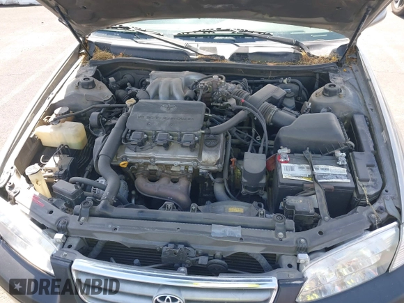 2000 Toyota Camry LE z VIN JT2BF22K4Y0286019, wystawiony jako IAAI lot #42083096 z przebiegiem 191 195 mil mil oraz . Historia ofert i sprzedaży dostępna na DreamBid. Obrazek 10.