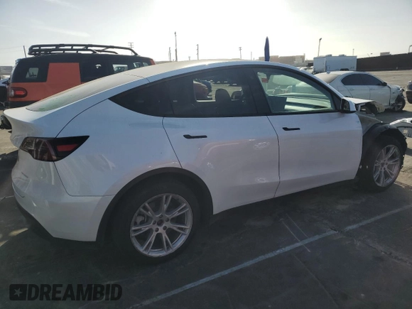2023 Tesla Model Y Long Range with VIN 7SAYGAEE7PF619170, listed as a Copart auction lot 47647585 with 35,674 mi miles and Salvage Title. Bid and sale history available at DreamBid. Image 3.