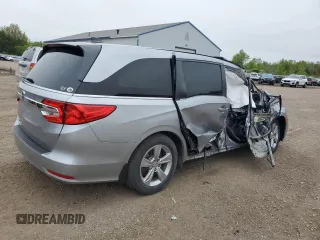 2019 Honda Odyssey EX-L z VIN 5FNRL6H7XKB049729, wystawiony jako Copart lot #55953075 z przebiegiem 129 194 mil mil oraz Szkoda całkowita • Salvage title. Historia ofert i sprzedaży dostępna na DreamBid. Obrazek 3.