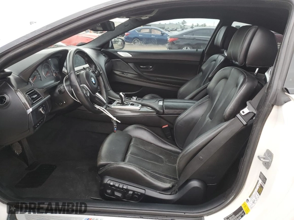 2014 BMW M6 z VIN WBSLX9C51ED160143, wystawiony jako Copart lot #88287015 z przebiegiem 91 717 mil mil oraz Szkoda całkowita • Salvage title. Historia ofert i sprzedaży dostępna na DreamBid. Obrazek 9.