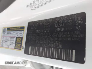2015 Kia Optima LX with VIN KNAGM4A75F5640302, listed as a IAAI auction lot 42179864 with 95,891 mi miles and . Bid and sale history available at DreamBid. Image 9.