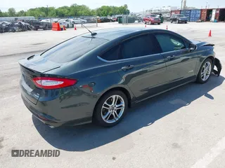 2015 Ford Fusion SE Hybrid with VIN 3FA6P0LU7FR224823, listed as a IAAI auction lot 42199479 with 81,835 mi miles and . Bid and sale history available at DreamBid. Image 4.