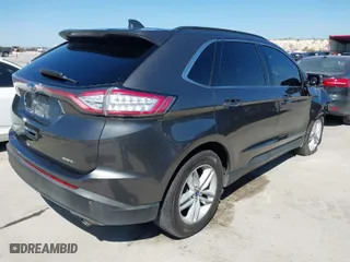 2018 Ford Edge SEL with VIN 2FMPK3J89JBC11871, listed as a IAAI auction lot 41778093 with 142,956 mi miles. Bid and sale history available at carsss.com. Image 4.