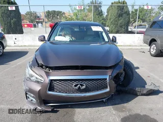 2014 Infiniti Q50 с VIN JN1BV7AP8EM670333, выставлен на аукционе IAAI как лот 41670015 с пробегом 59 427 миль миль и . История ставок и продаж доступна на DreamBid. Изображение 13.