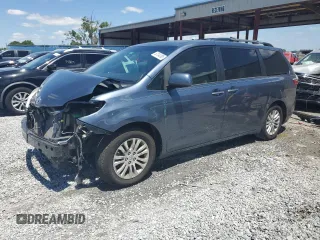 2015 Toyota Sienna XLE with VIN 5TDYK3DC7FS636021, listed as a Copart auction lot 53134385 with 126,276 mi miles and Salvage Title. Bid and sale history available at carsss.com. Image 1.
