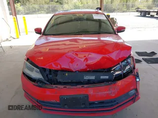 2015 Volkswagen Jetta Sedan 1.8T SE with VIN 3VWD17AJ3FM284712, listed as a IAAI auction lot 42052882 with 140,088 mi miles. Bid and sale history available at carsss.com. Image 12.