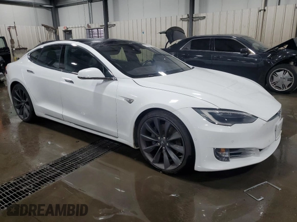 2016 Tesla Model S 90D with VIN 5YJSA1E22GF150015, listed as a Copart auction lot 61559375 with 75,609 mi miles and Salvage title. Bid and sale history available at DreamBid. Image 4.