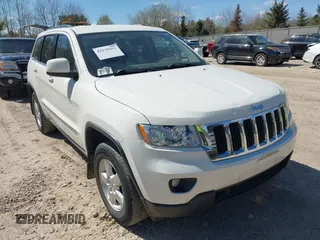 2011 Jeep Grand Cherokee Laredo with VIN 1J4RR4GG9BC556083, listed as a IAAI auction lot 42139453 with 145,623 mi miles and . Bid and sale history available at DreamBid. Image 1.