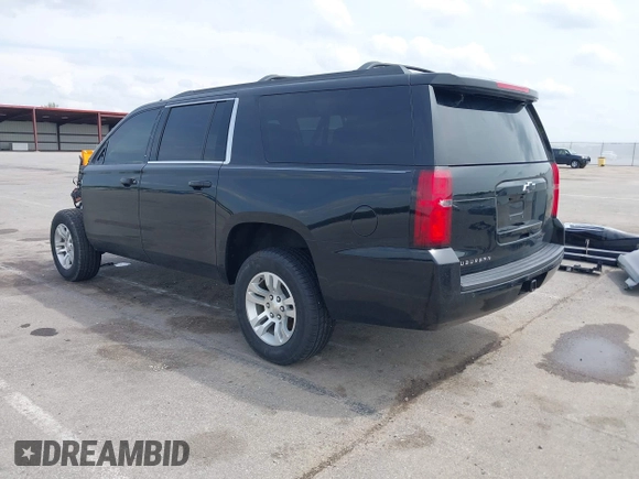 2019 Chevrolet Suburban LS with VIN 1GNSKGKC4KR128685, listed as a IAAI auction lot 42148721 with 92,346 mi miles and . Bid and sale history available at DreamBid. Image 3.