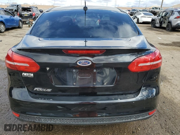2018 Ford Focus S with VIN 1FADP3E2XJL322238, listed as a Copart auction lot 48520125 with 97,718 mi miles and Salvage Title. Bid and sale history available at carsss.com. Image 6.